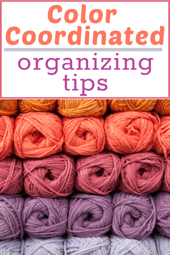 skeins of yarn organized in rows by color