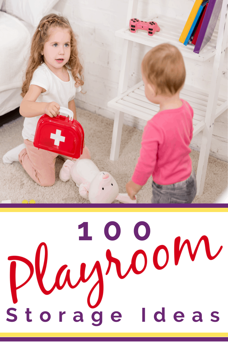 2 young girls playing with stuffed animal an doctor's kit
