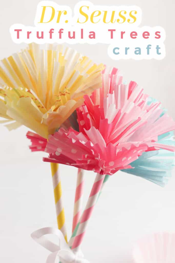 yellow, pink and blue paper flowers on striped stems