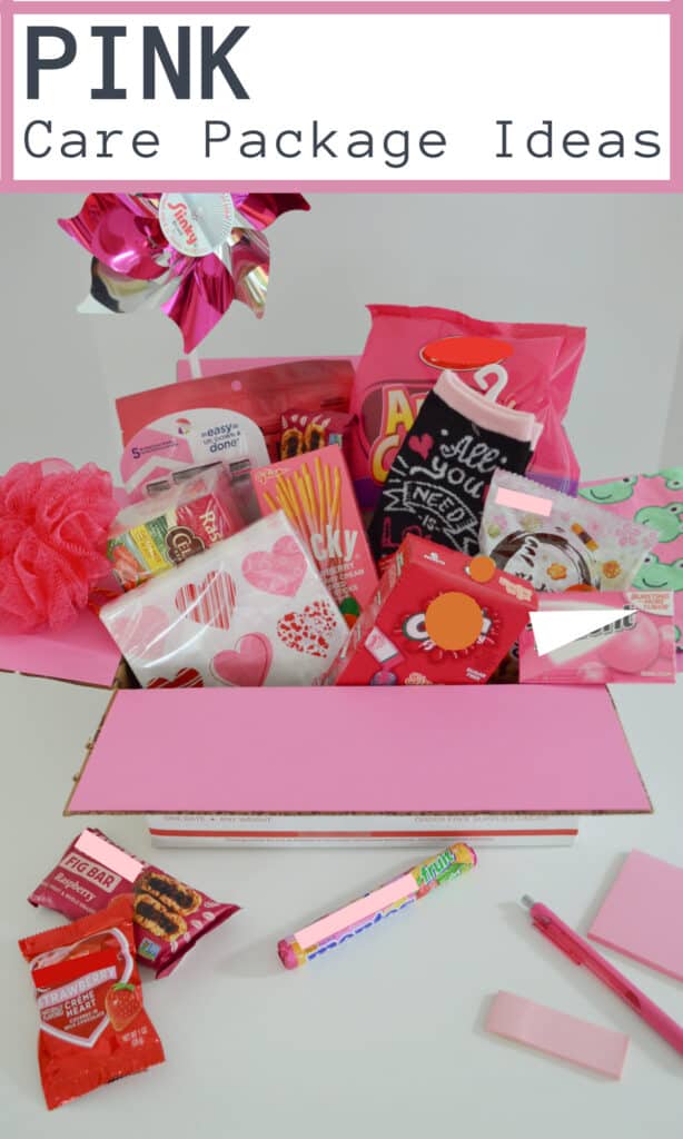 pink box filled with pink themed gift items