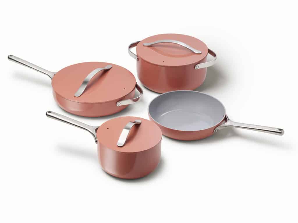 2 pans and 2 pots in terracotta color on white background.