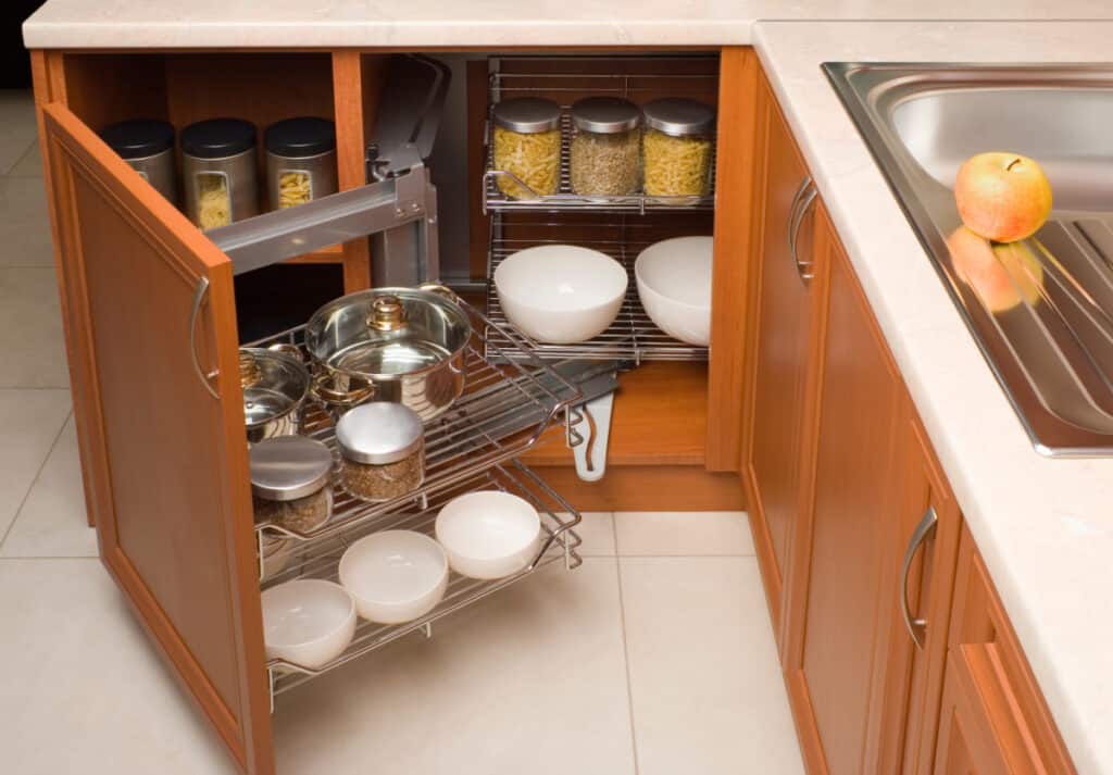 open lower kitchen cabinet with specialty organizer.