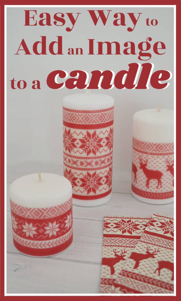 3 candles with red Christmas snowflake and reindeer design on white wood table.