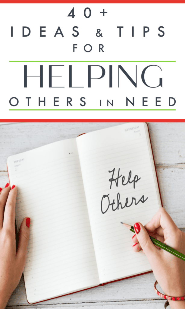 woman's hands writing "help others" in journal.